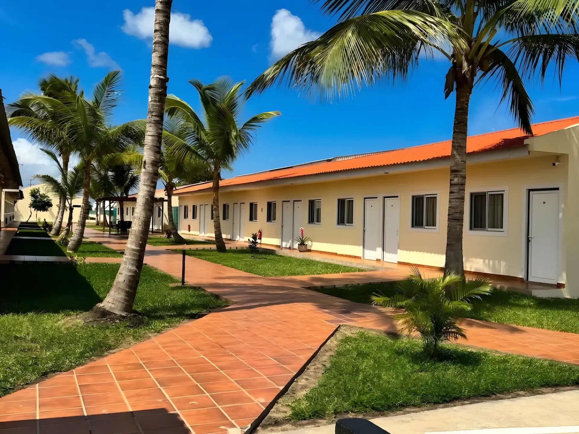 Garden walkway between the guest wings at Casa Erica, Soyo